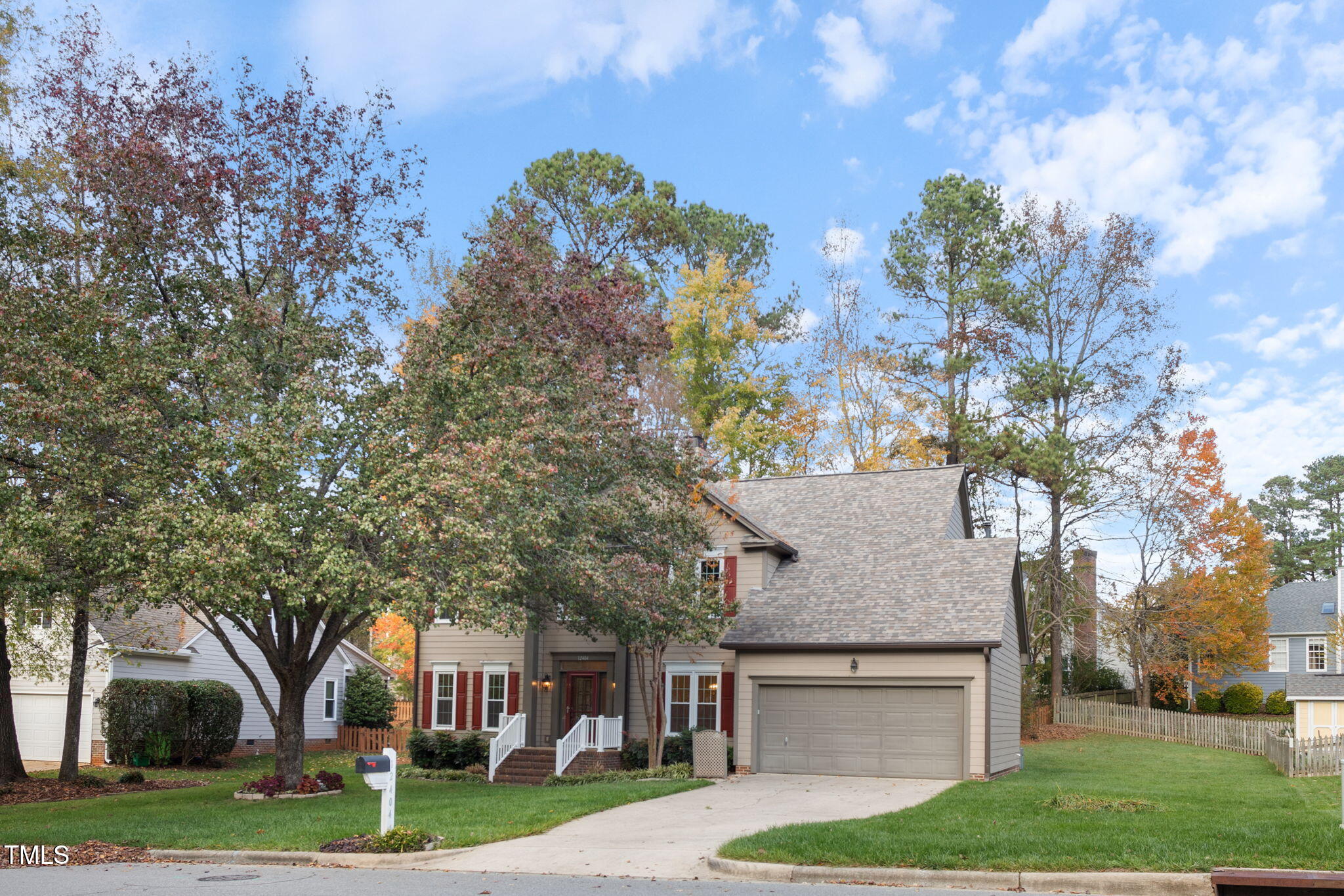 12404 Tappersfield Court Raleigh, NC 27613 - Photo 42 of 46 a front view of a house with garden