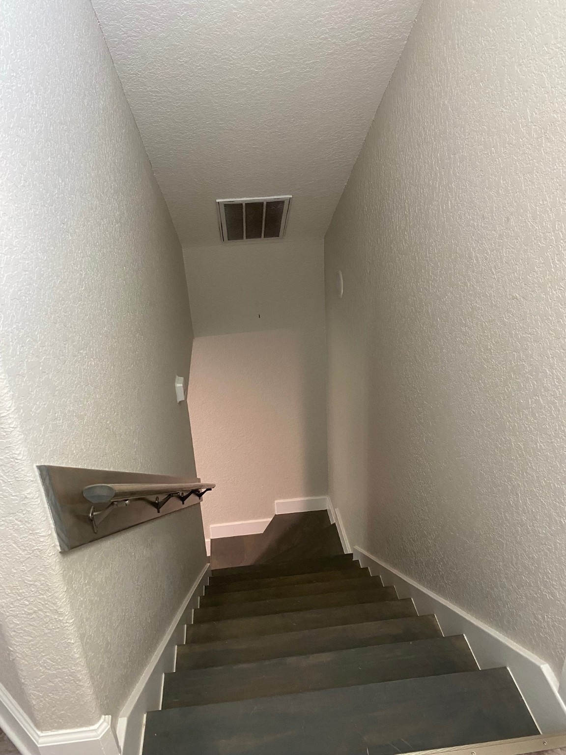 106 Pompano Lane Surfside Beach, TX 77541 - Photo 27 of 39 Stairwell from Upstairs Bedrooms to Living Area