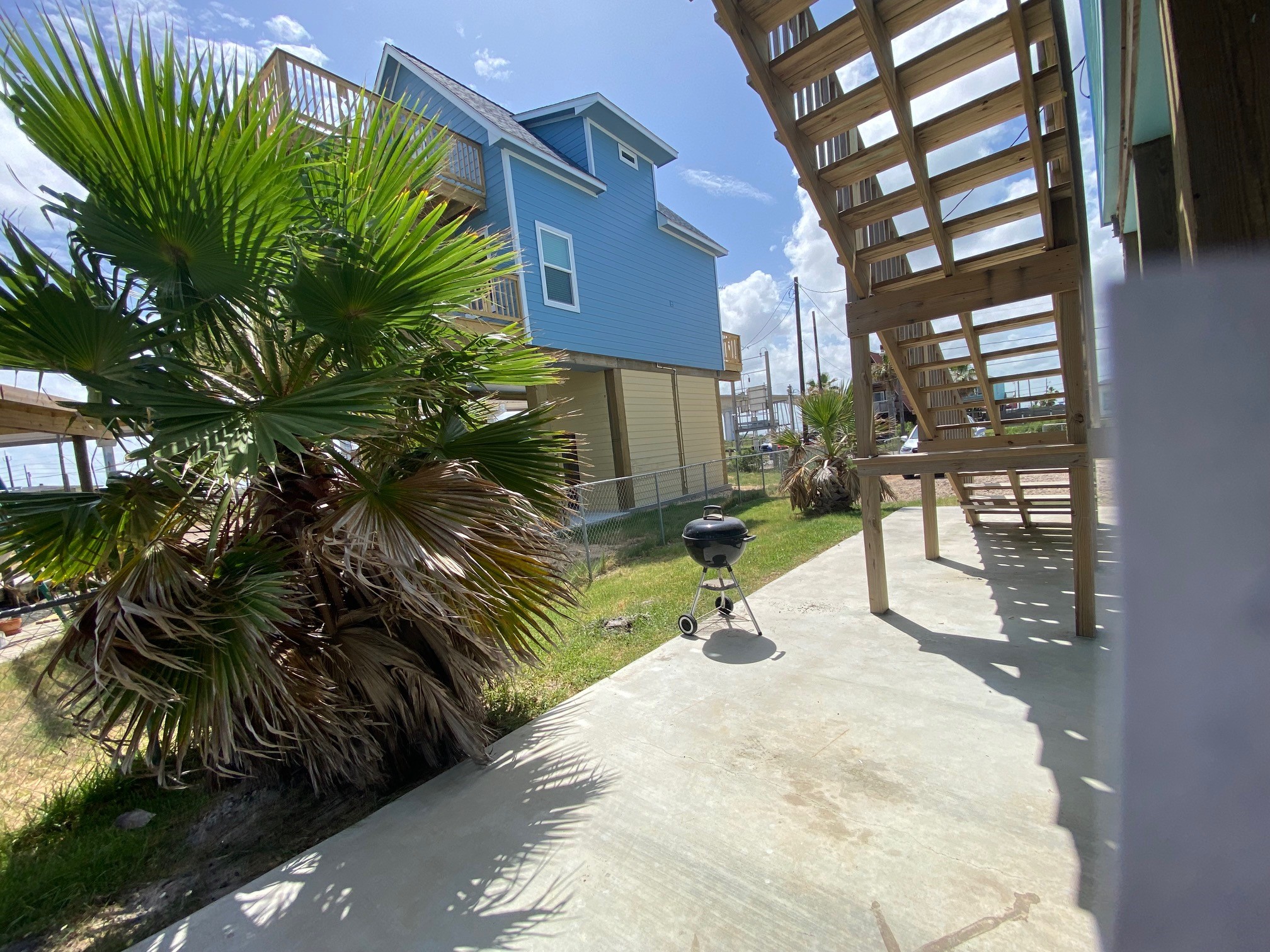 106 Pompano Lane Surfside Beach, TX 77541 - Photo 29 of 39 Right Side of House with Stairs