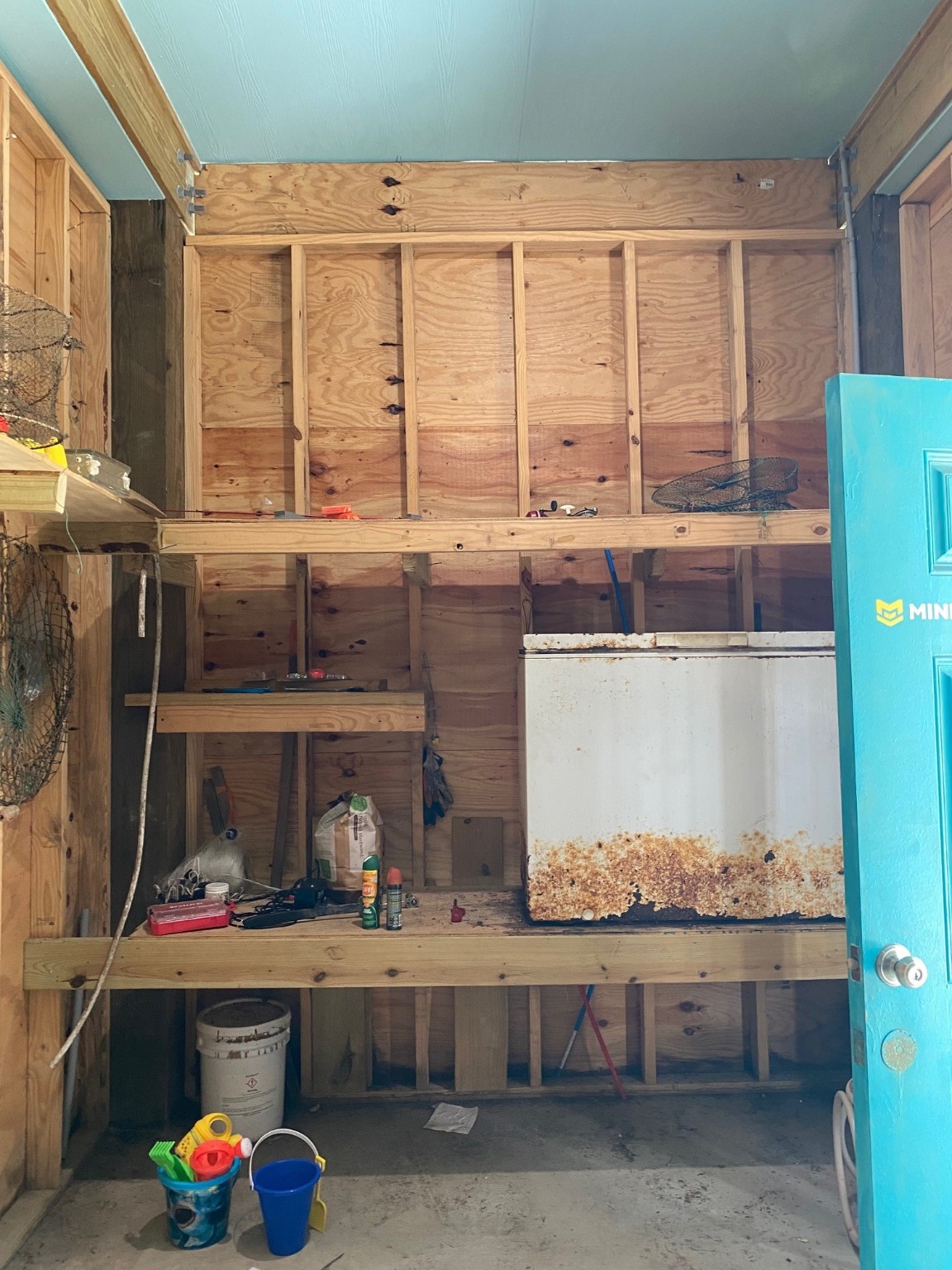 106 Pompano Lane Surfside Beach, TX 77541 - Photo 37 of 39 Workshop Area & Old Deep Freeze in Garage