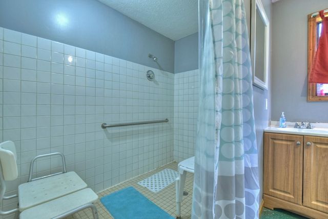 a room with cabinets and a wooden floor