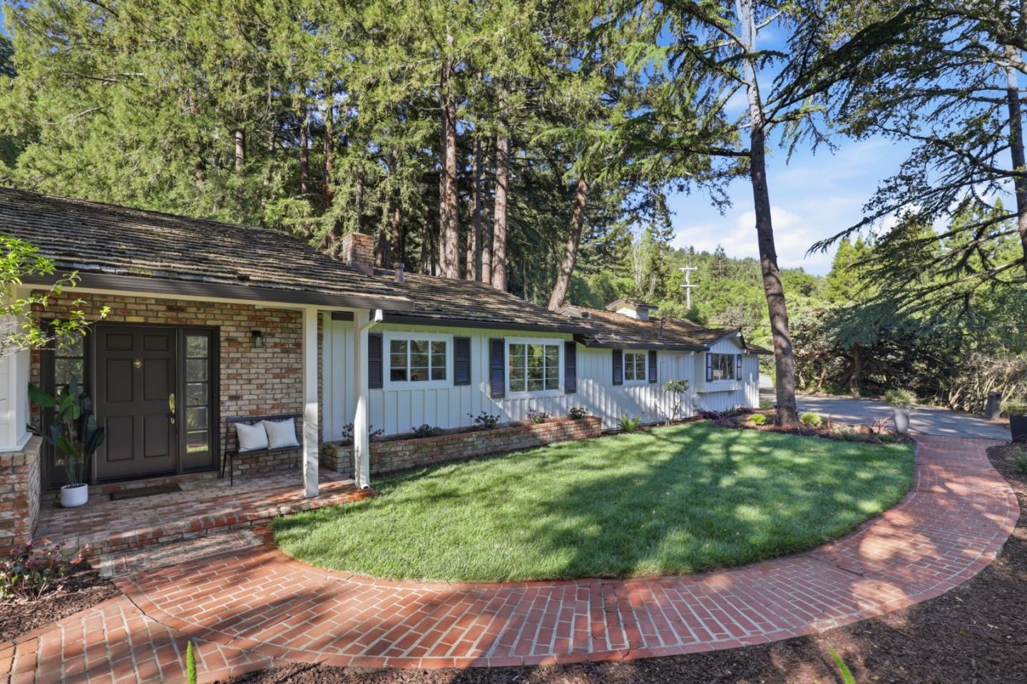 425 Summit Spring Road Woodside, CA 94062 - Photo 2 of 42 front view of a house with a yard