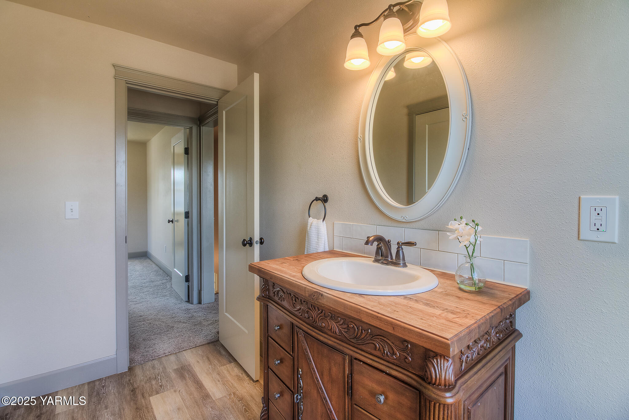 221 4th Avenue Zillah, WA 98953 - Photo 22 of 32 a bathroom with a sink and a mirror