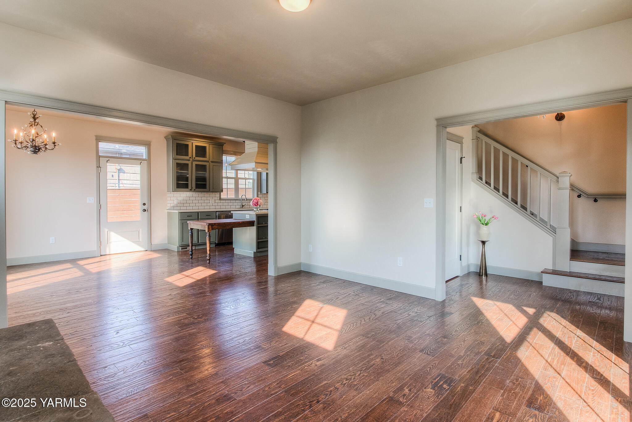 221 4th Avenue Zillah, WA 98953 - Photo 5 of 32 a view of empty room with wooden floor and fireplace