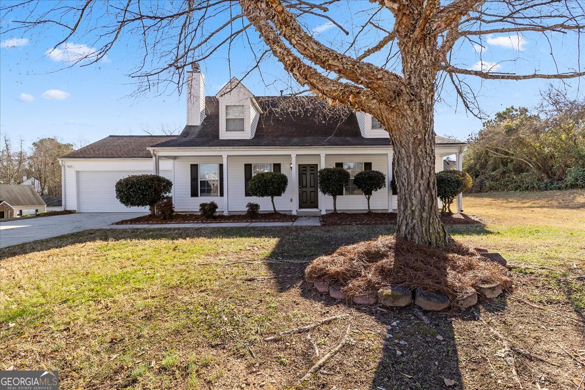 2603 Old Rex Morrow Road Ellenwood, GA 30294 - Photo 2 of 32 a front view of a house with swimming pool