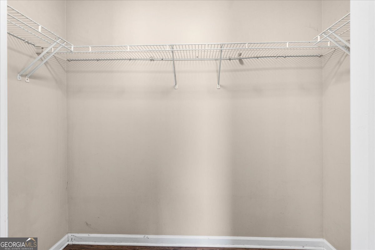 2603 Old Rex Morrow Road Ellenwood, GA 30294 - Photo 21 of 32 a view of a room with racks on the wall