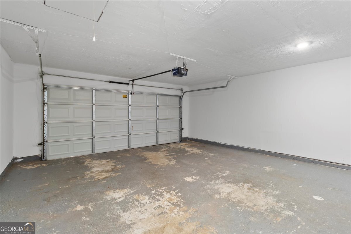 2603 Old Rex Morrow Road Ellenwood, GA 30294 - Photo 27 of 32 a view of a garage