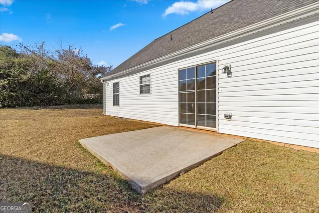 a view of a yard with an outdoor space