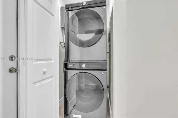 a close view of a utility room with washer and a dryer