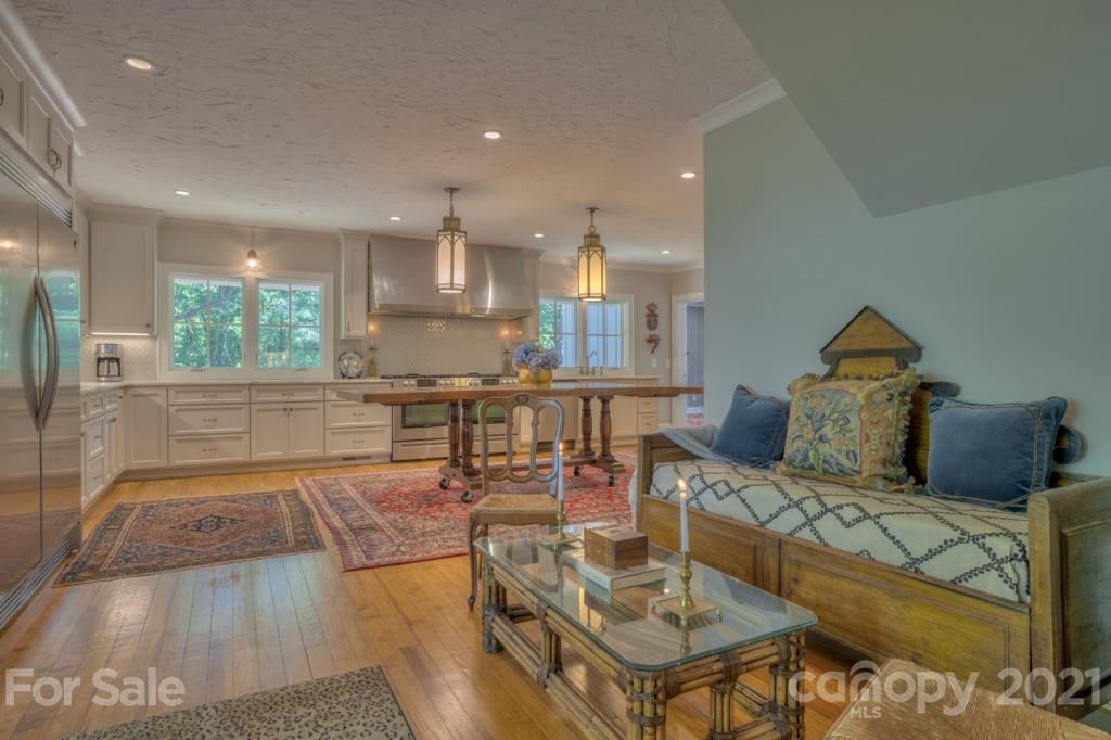 202 Blockhouse Road Landrum, SC 29356 - Photo 11 of 45 a living room with furniture and kitchen view