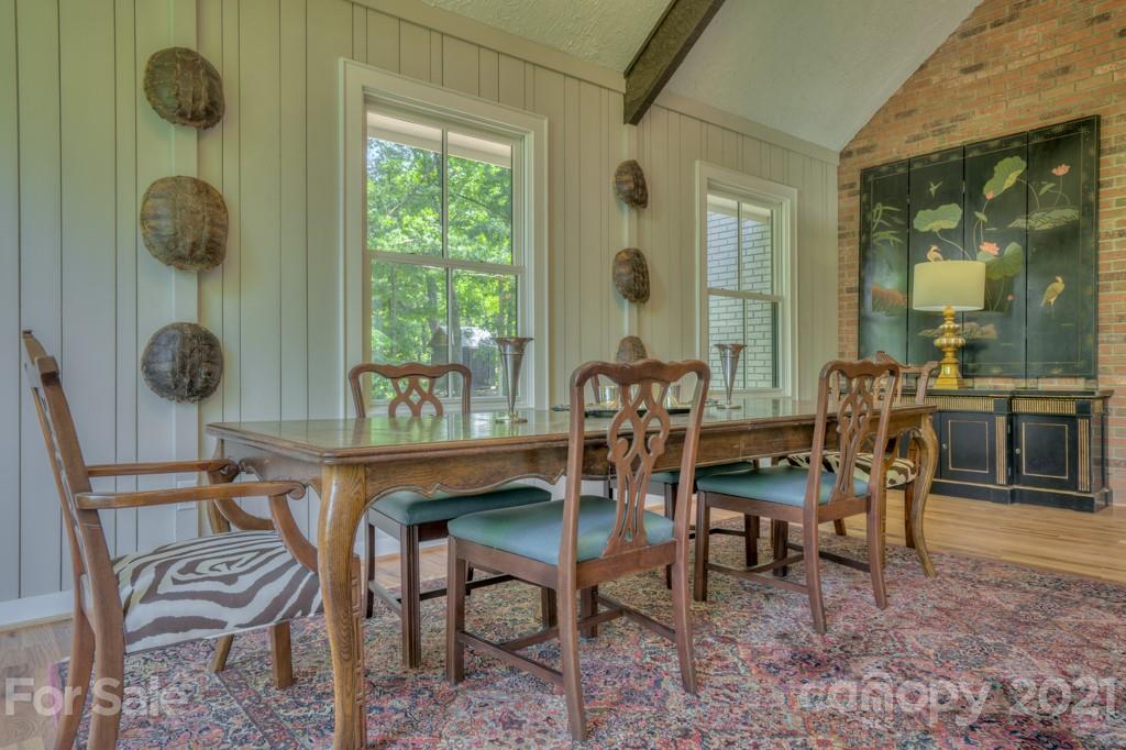 202 Blockhouse Road Landrum, SC 29356 - Photo 21 of 45 a dining room with furniture and a window