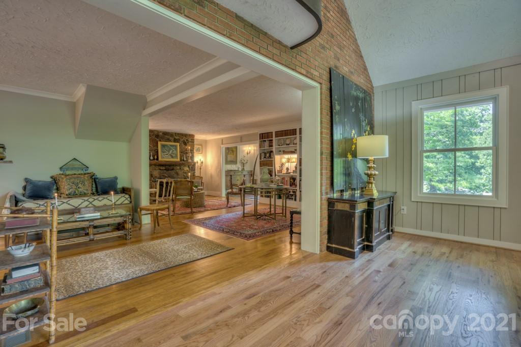 202 Blockhouse Road Landrum, SC 29356 - Photo 25 of 45 a living room with furniture window and wooden floor
