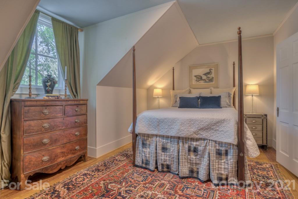 202 Blockhouse Road Landrum, SC 29356 - Photo 41 of 45 a bedroom with a bed and a window