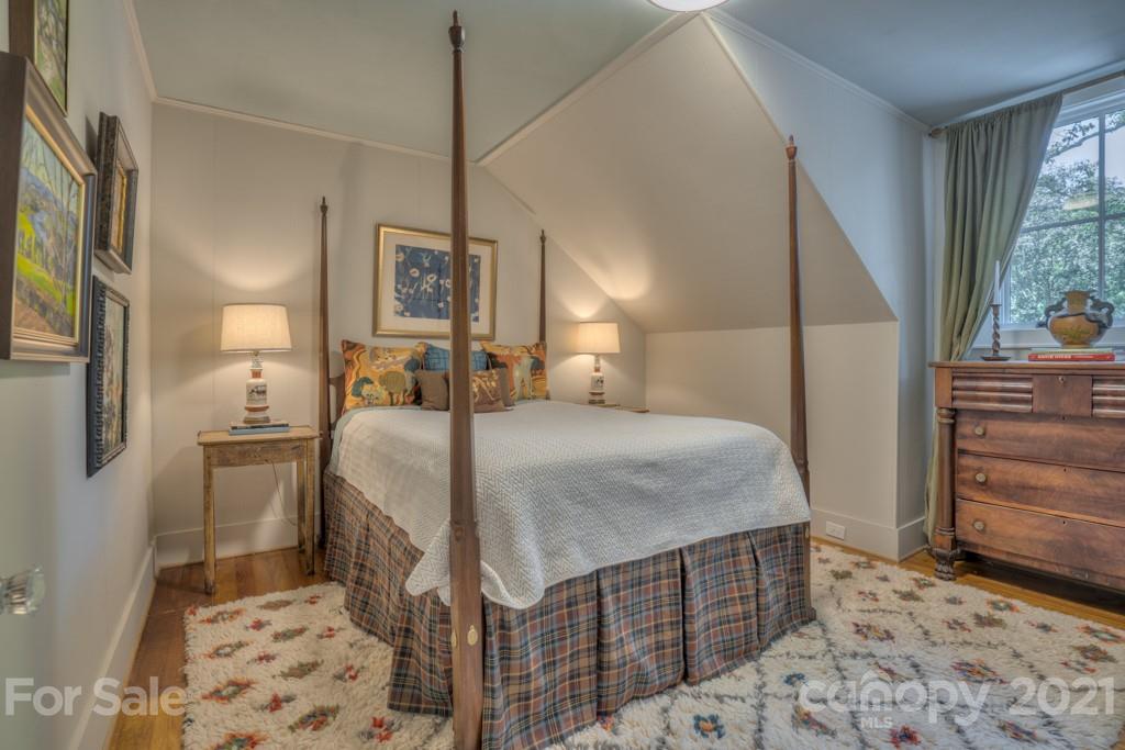 202 Blockhouse Road Landrum, SC 29356 - Photo 45 of 45 a bedroom with a bed and a dresser