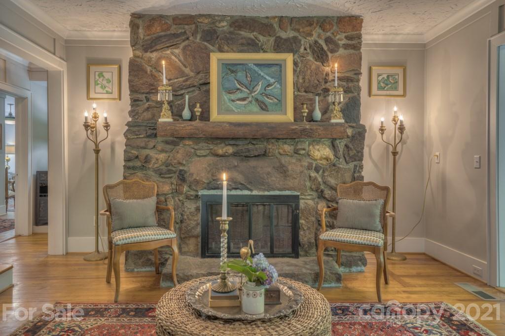 202 Blockhouse Road Landrum, SC 29356 - Photo 7 of 45 a living room with furniture and a fireplace