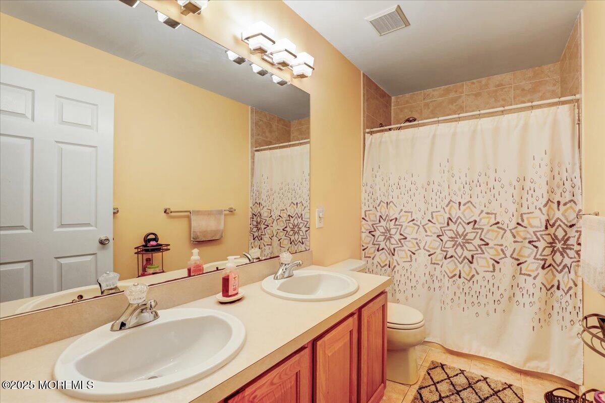 3 Kindling Way Jackson, NJ 08527 - Photo 22 of 51 a bathroom with a sink toilet and shower