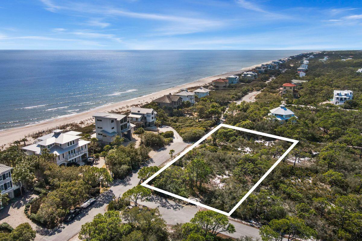 1644 Hawthorne Lane St. George Island, FL 32328 - Photo 3 of 24 a view of a tennis court