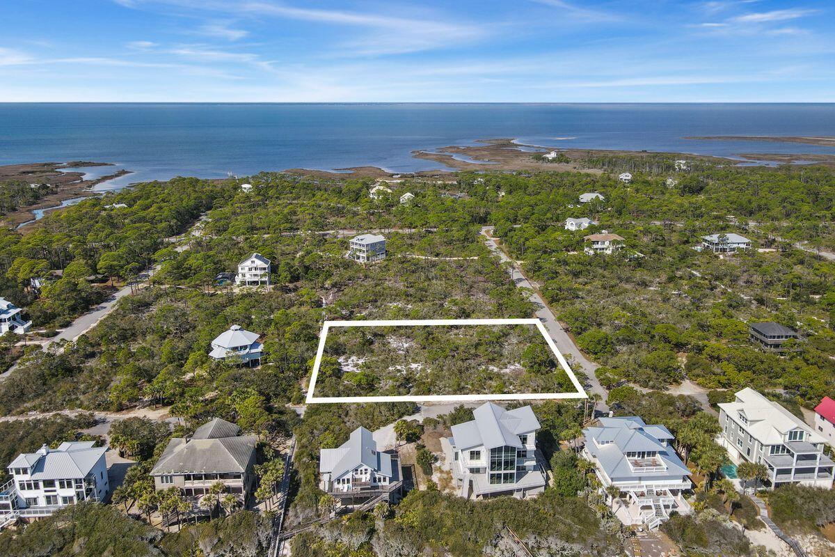 1644 Hawthorne Lane St. George Island, FL 32328 - Photo 4 of 24 a view of a city