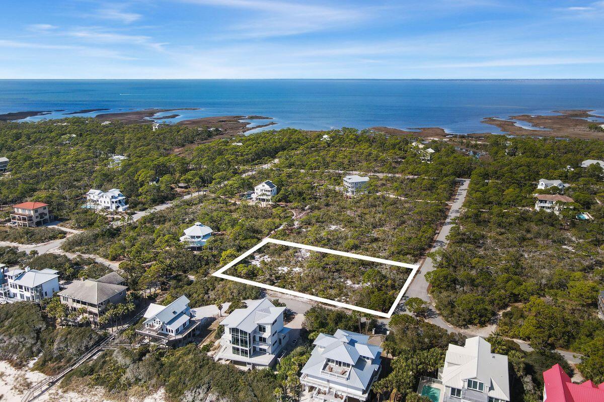 1644 Hawthorne Lane St. George Island, FL 32328 - Photo 6 of 24 a view of a city with an ocean