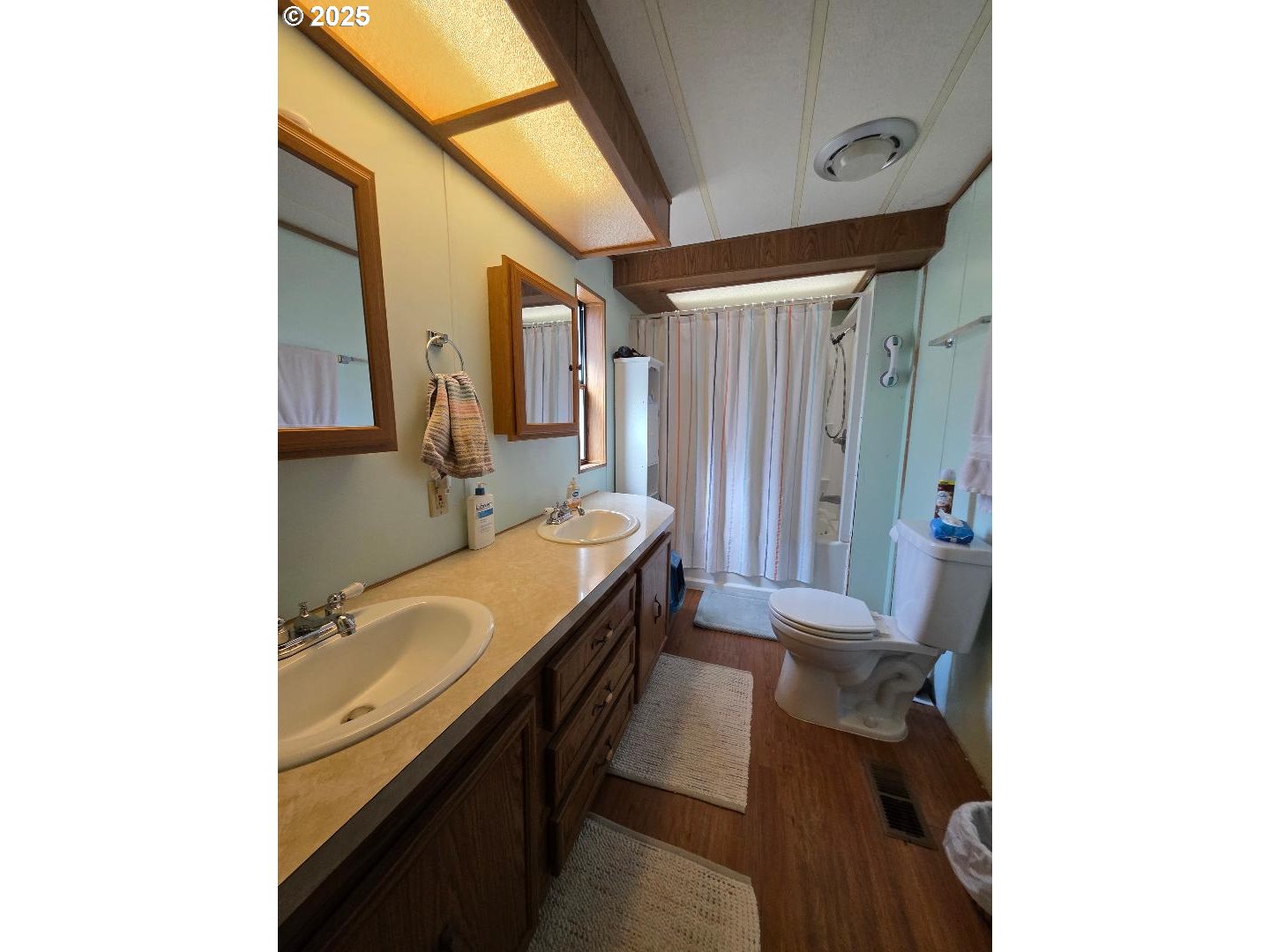 358 Oak Park Place Wamic, OR 97063 - Photo 16 of 29 a spacious bathroom with a sink and a mirror