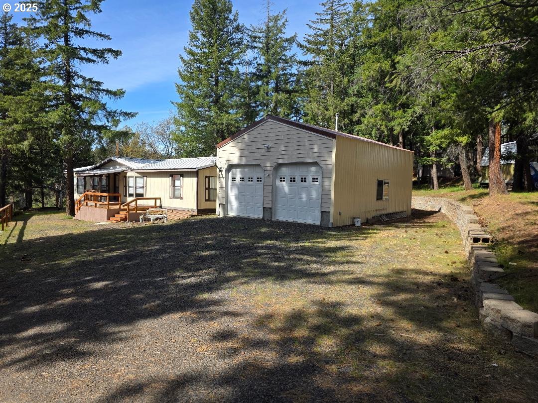 358 Oak Park Place Wamic, OR 97063 - Photo 2 of 29 a view of a house with a yard