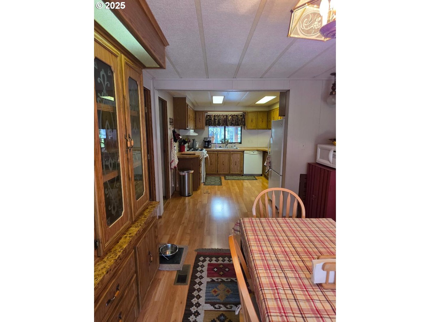 358 Oak Park Place Wamic, OR 97063 - Photo 9 of 29 a view of a living room with a couch