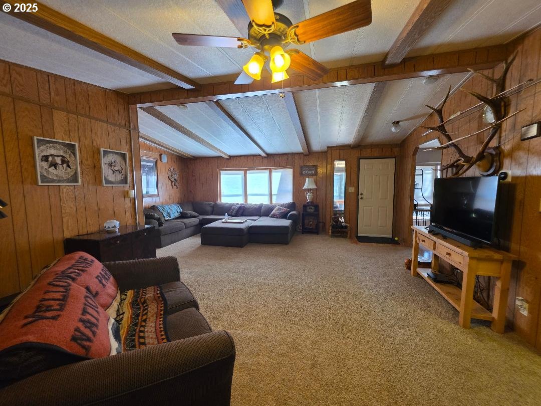 358 Oak Park Place Wamic, OR 97063 - Photo 10 of 29 a living room with furniture and a flat screen tv
