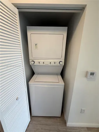 a utility room with a washer and dryer