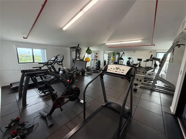 a view of a room with gym equipment