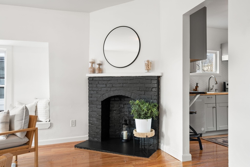 19 Berkley Road Hull, MA 02045 - Photo 13 of 42 a living room with furniture and a fireplace