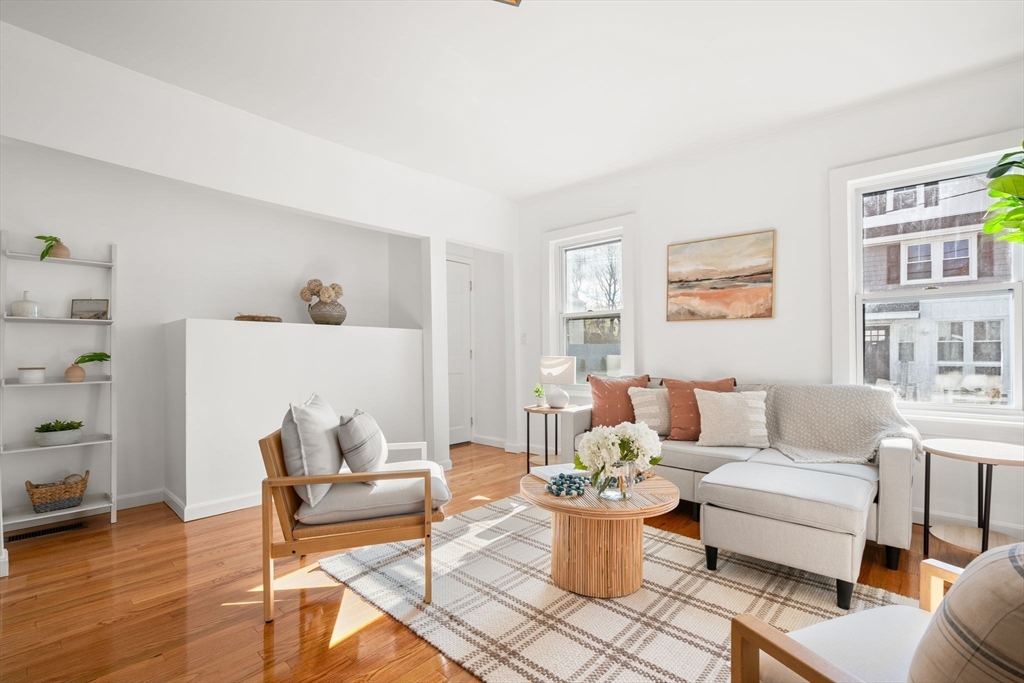 19 Berkley Road Hull, MA 02045 - Photo 14 of 42 a living room with furniture a rug and a window