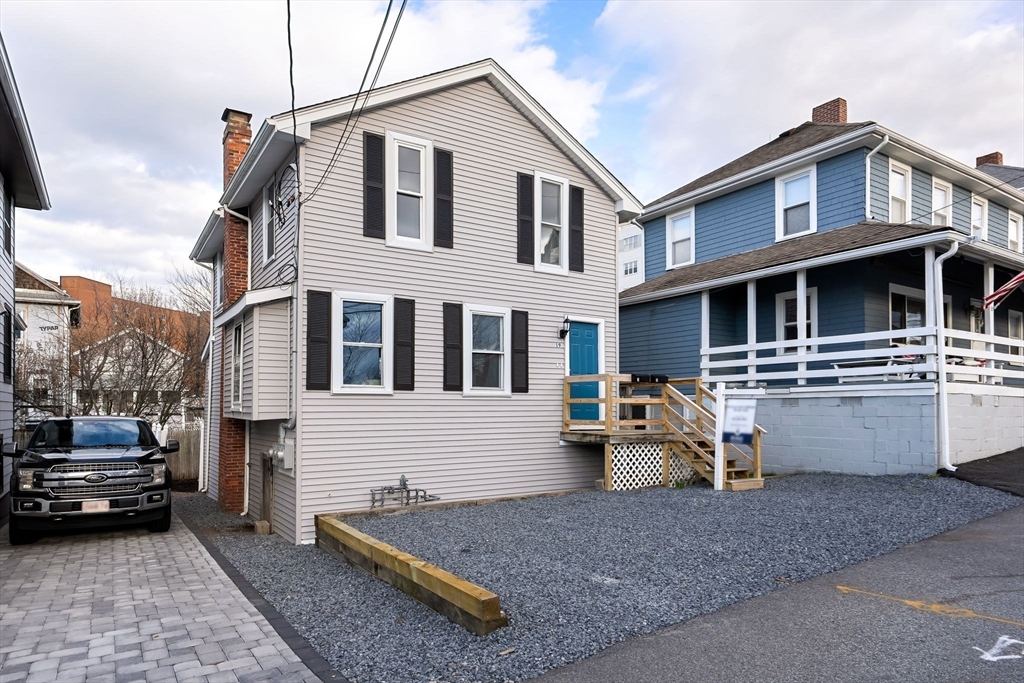 19 Berkley Road Hull, MA 02045 - Photo 3 of 42 a front view of a house with a yard