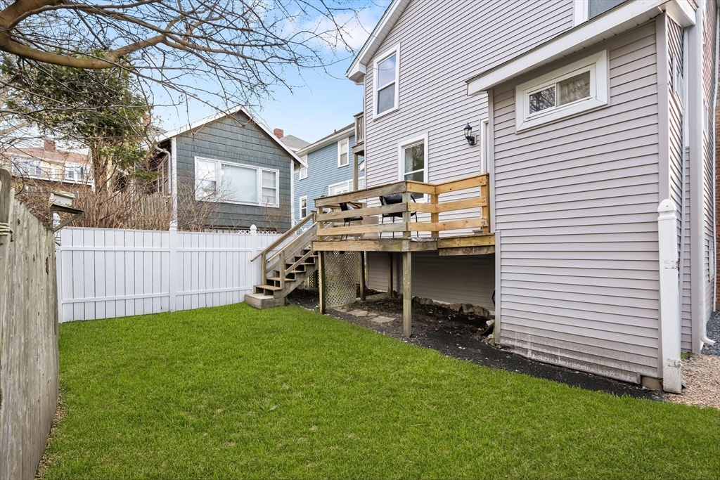 19 Berkley Road Hull, MA 02045 - Photo 41 of 42 a view of a house with a back yard