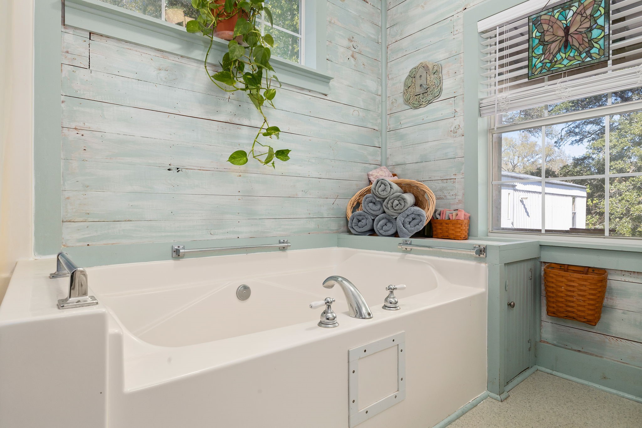 8103 Adamek Road Brenham, TX 77833 - Photo 10 of 42 a bathroom with a sink and a bathtub
