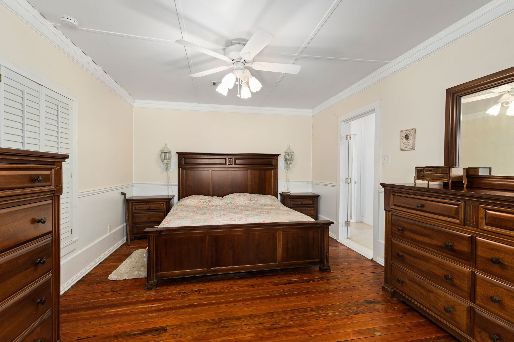 8103 Adamek Road Brenham, TX 77833 - Photo 12 of 42 a bedroom with a bed and a dresser