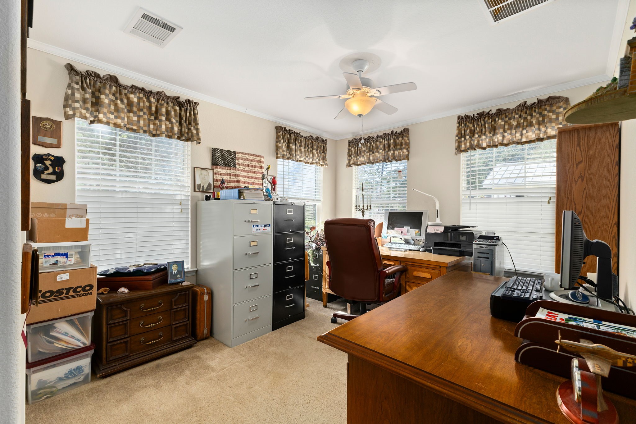 8103 Adamek Road Brenham, TX 77833 - Photo 27 of 42 a view of a workspace with furniture and a window