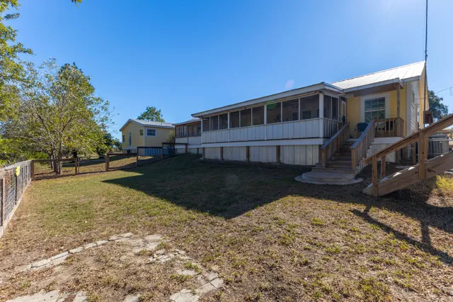 a view of a livingroom with furniture