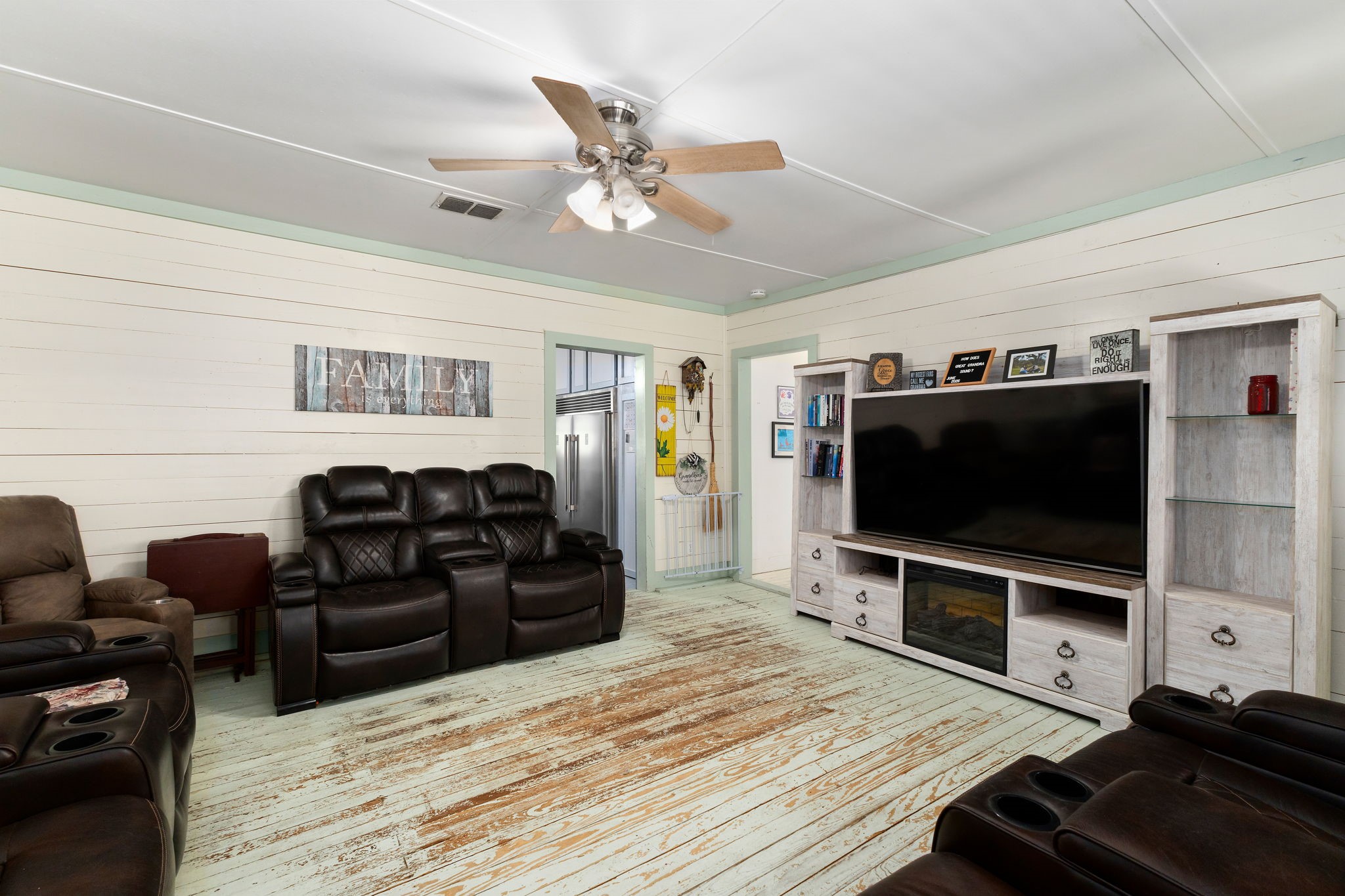 8103 Adamek Road Brenham, TX 77833 - Photo 3 of 42 a living room with furniture and a flat screen tv