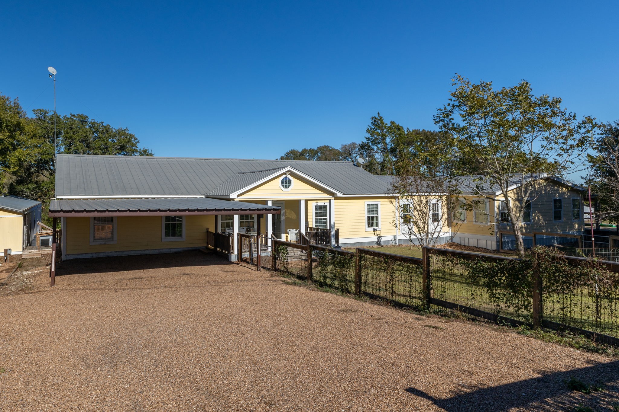 8103 Adamek Road Brenham, TX 77833 - Photo 40 of 42 front view of a house with a yard
