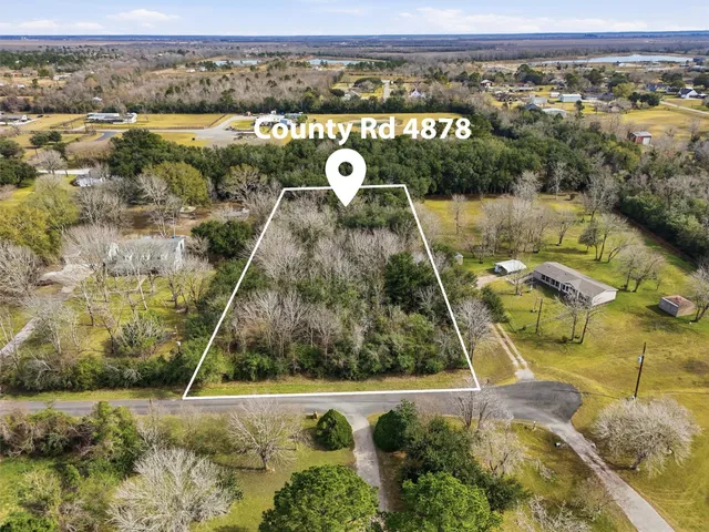 a view of swimming pool with a yard