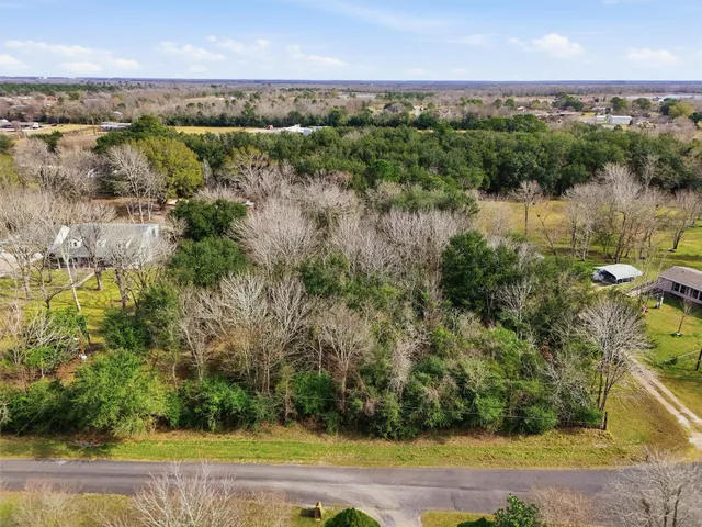 a view of lake with green space