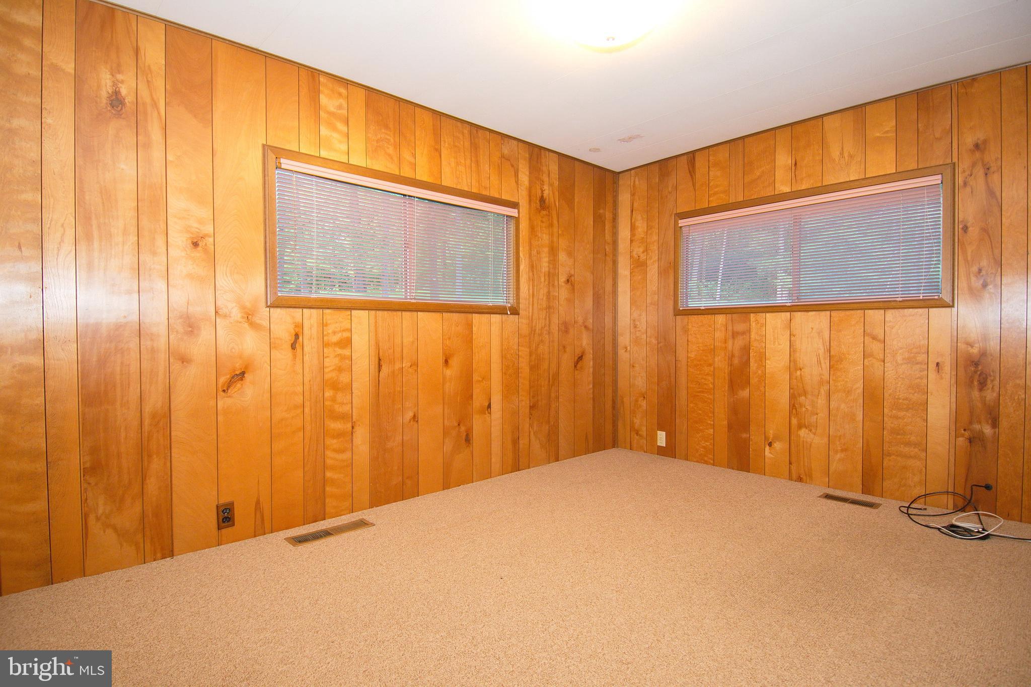 2881 Gallows Hill Road Riegelsville, PA 18077 - Photo 22 of 36 a bedroom with a bed and a window