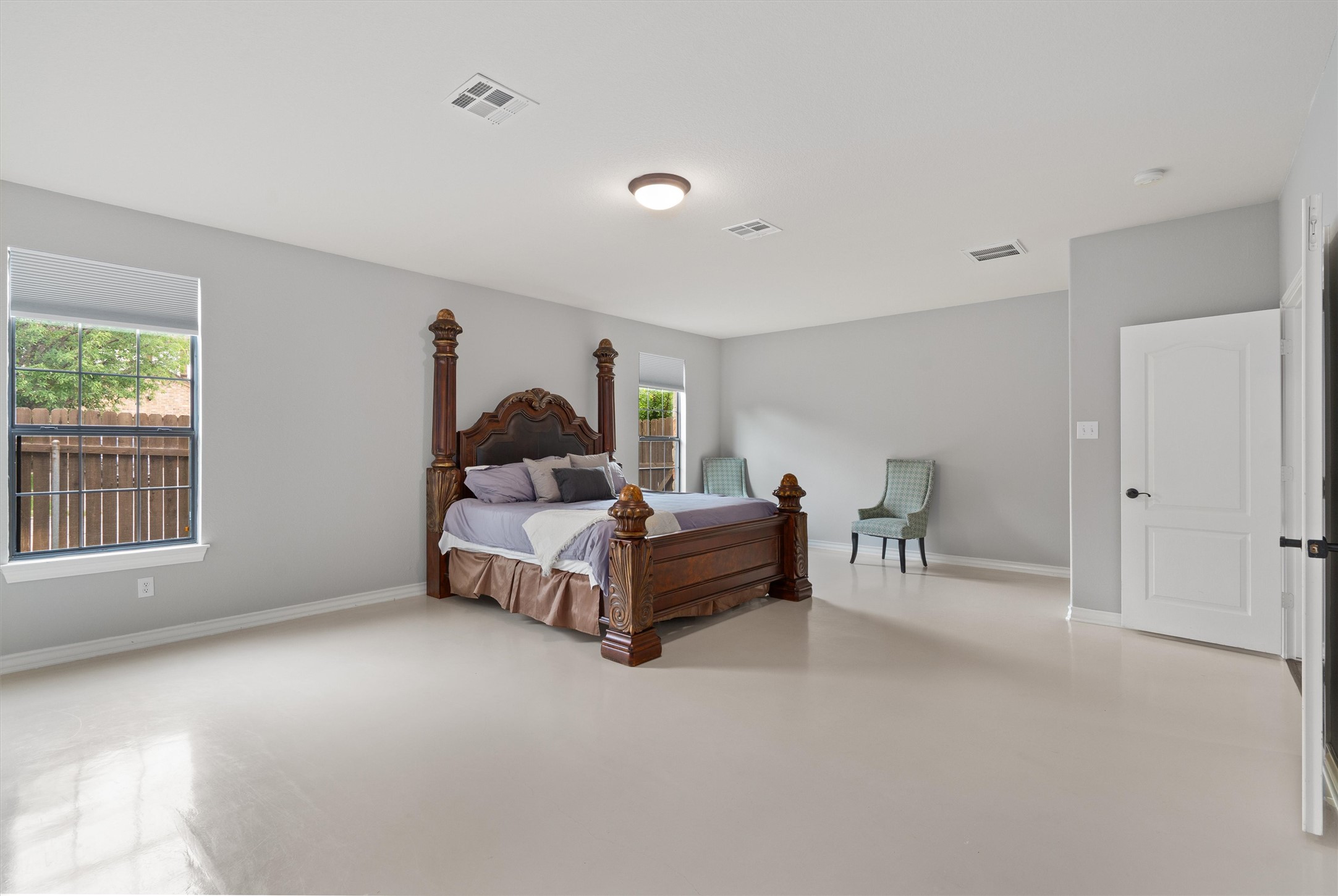 101 Breakaway Road Cedar Park, TX 78613 - Photo 17 of 37 Bedroom with baseboards and concrete flooring