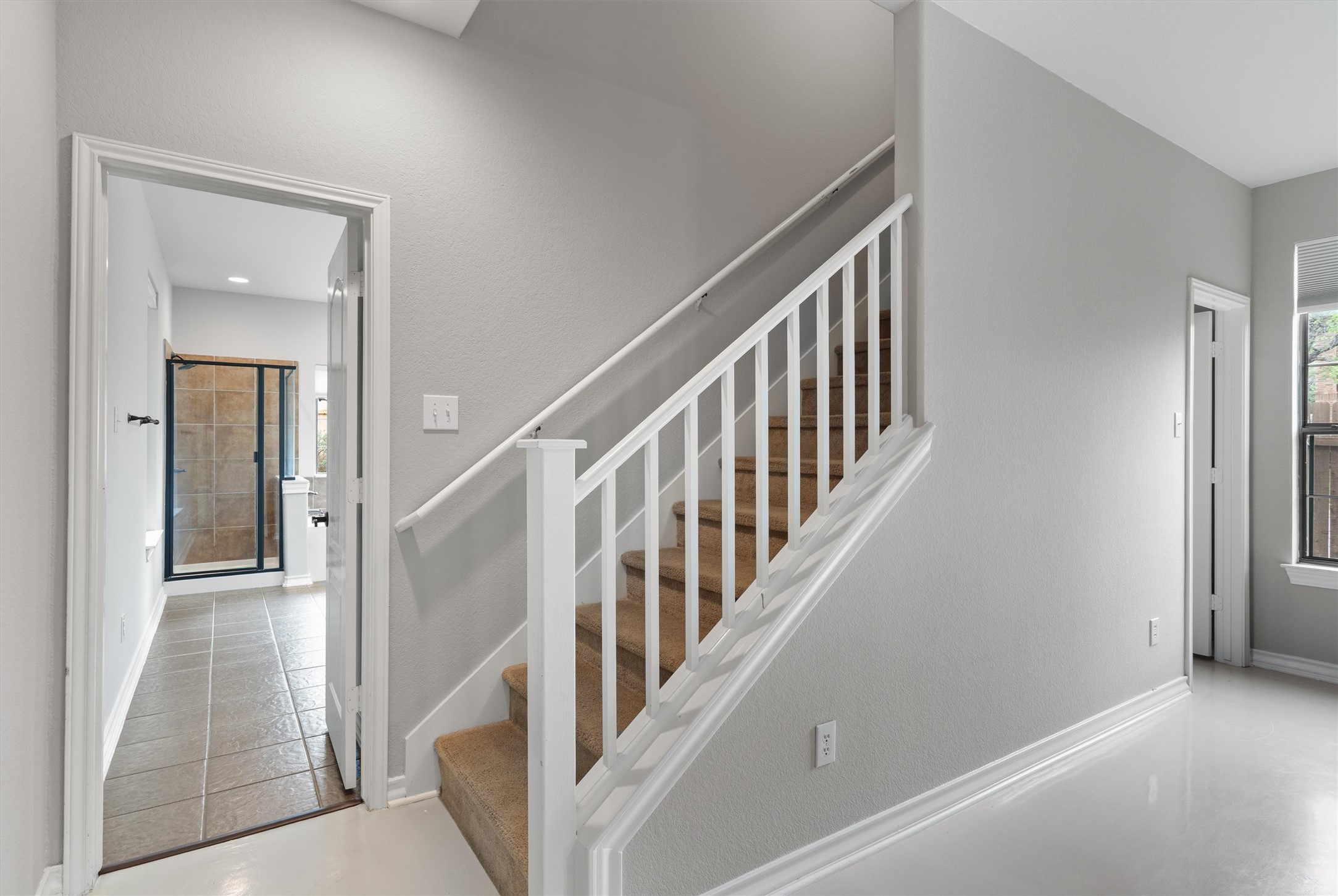 101 Breakaway Road Cedar Park, TX 78613 - Photo 18 of 37 Stairs with baseboards and tile patterned flooring