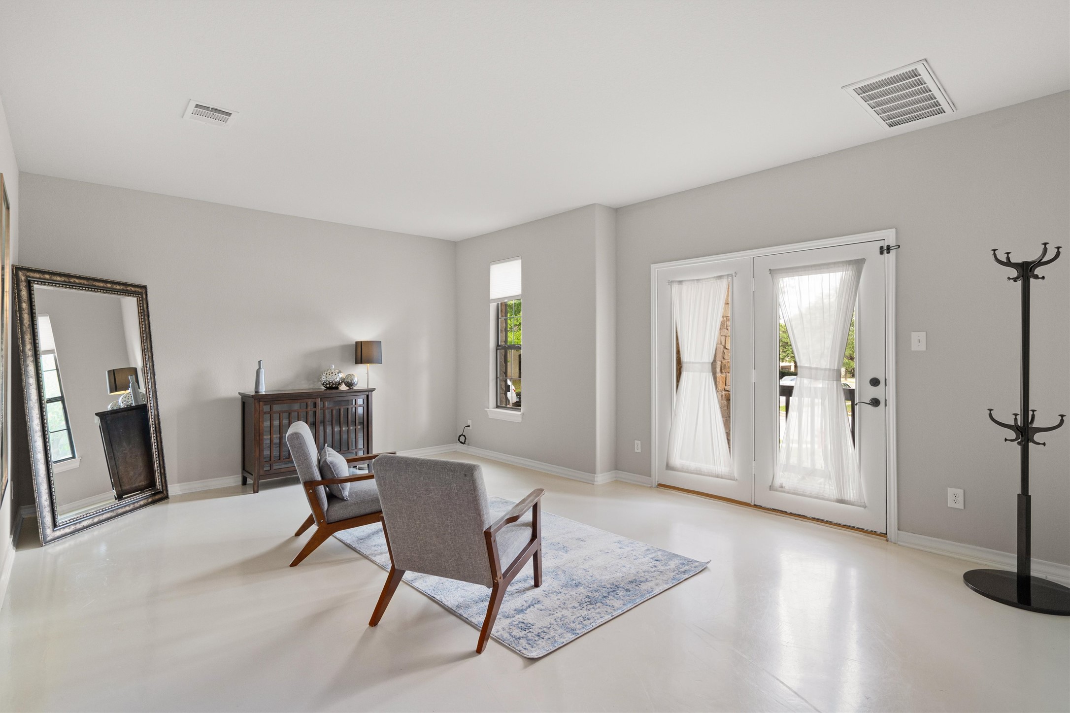 101 Breakaway Road Cedar Park, TX 78613 - Photo 4 of 37 Living area featuring baseboards
