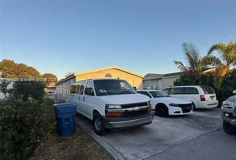 a house view with a garden space