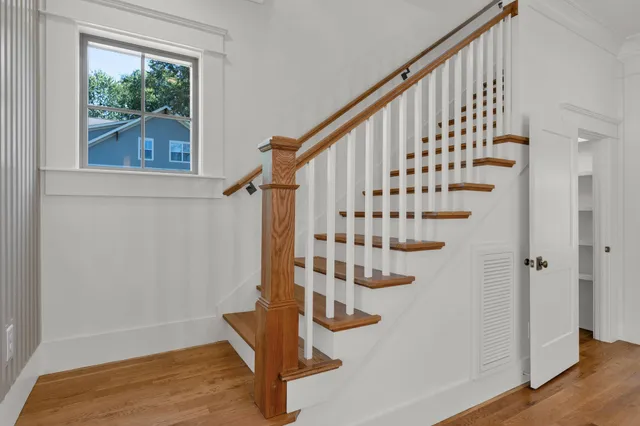 a view of entryway with wooden floor
