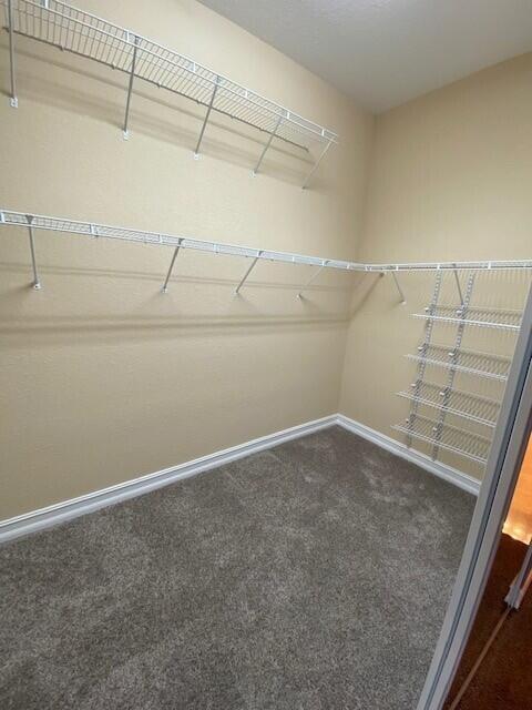 9504 Equus Circle Boynton Beach, FL 33472 - Photo 19 of 29 a view of a room with racks on the wall