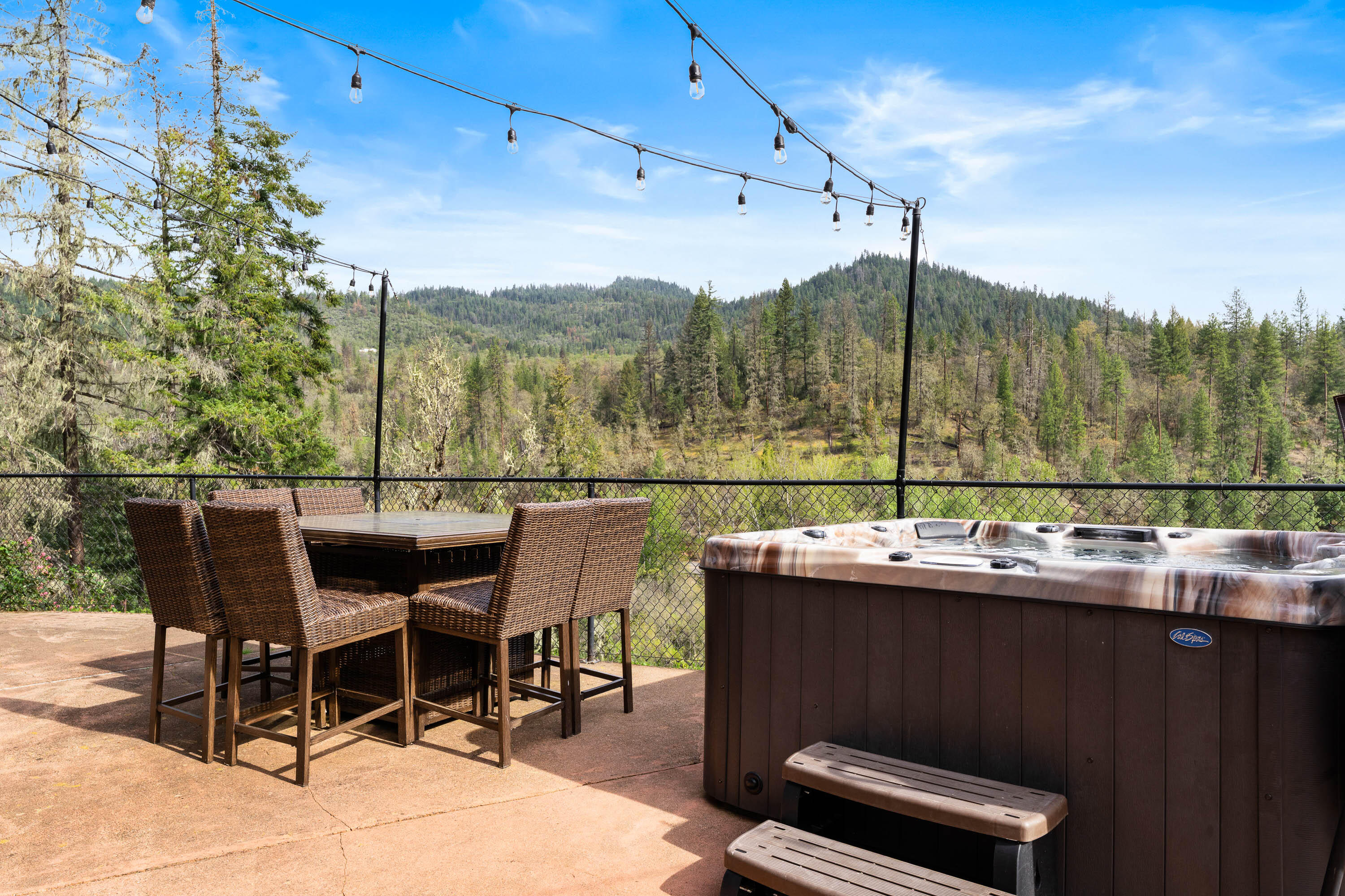 7201 Crowfoot Road Trail, OR 97541 - Photo 34 of 56 a view of a chairs and table in patio