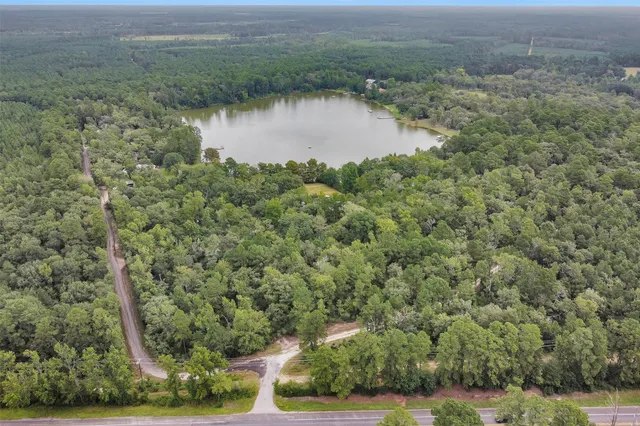 an aerial view of residential house with outdoor space